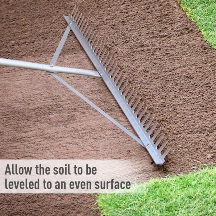 The smooth side of the landscape rake used for leveling soil in a garden, an essential garden tools accessory.