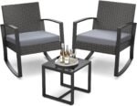 The sleek glass table included in the patio furniture set, offering functionality and elegance for any outdoor setting.